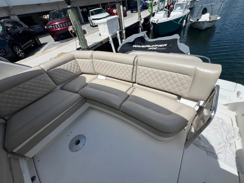 Slide: The Image of Luxurious seating on 2013 Sea Ray 410 Sundancer yacht at marina. - 10