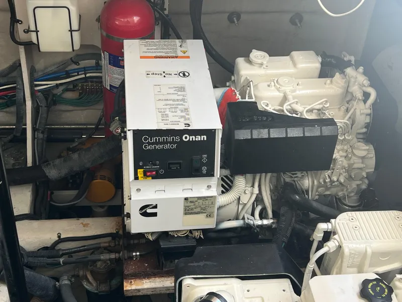 Slide: The Image of Cummins Onan generator in 2013 Sea Ray 410 Sundancer engine room. - 41