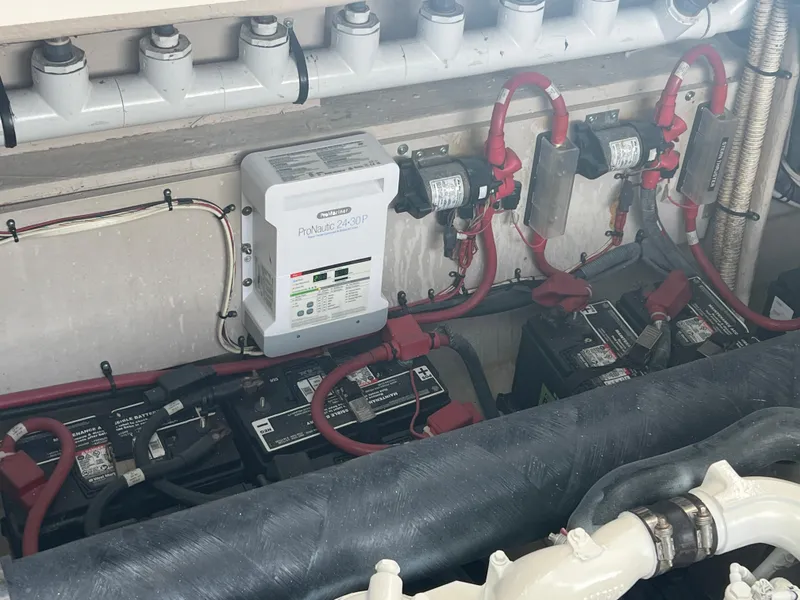 Slide: The Image of Electrical system of a 2013 Sea Ray 410 Sundancer with batteries and ProNautic charger. - 42