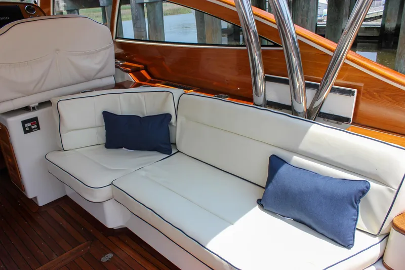 Slide: The Image of Luxurious seating on 2008 Hinckley Talaria 38R Convertible yacht with blue cushions. - 5
