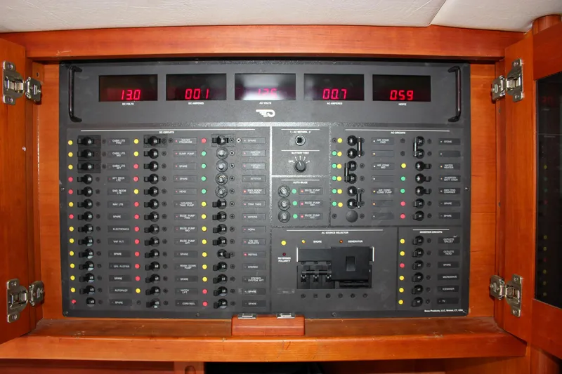 Slide: The Image of Electrical control panel of a 2008 Hinckley Talaria 38R Convertible boat. - 32