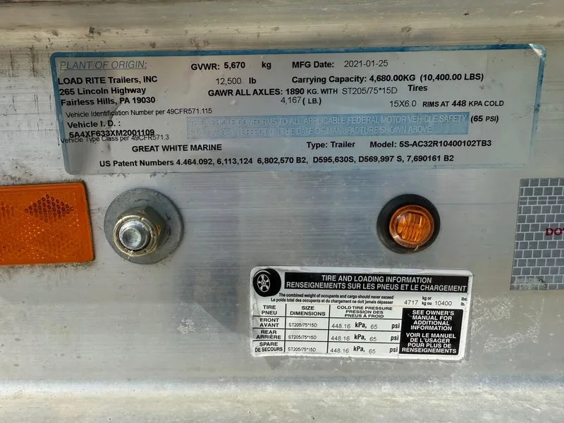 Slide: The Image of Label on Load Rite trailer with specifications and safety information. - 10
