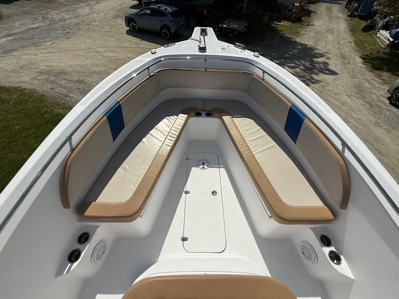Slide: The Image of 2008 Pro-Line 29 Grand Sport boat with spacious seating and sleek design. - 14