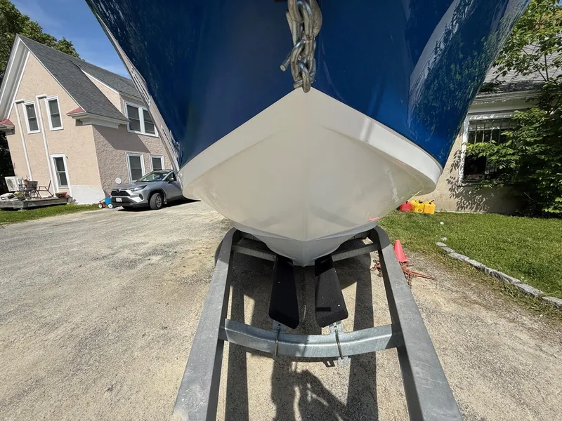 Slide: The Image of 2008 Pro-Line 29 Grand Sport boat on trailer in residential driveway. - 9