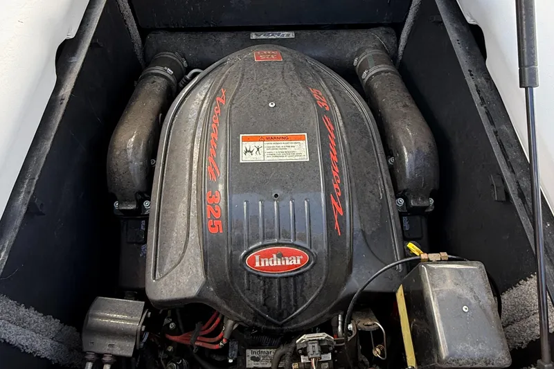 Slide: The Image of 2008 Supra Launch 22 SSV engine, Indmar Assault 325, in a boat compartment. - 9