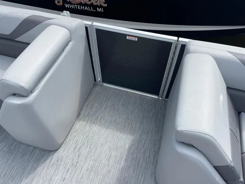 Slide: The Image of 2022 Bennington 21 SX boat interior with gray seating and flooring, Whitehall, MI. - 7