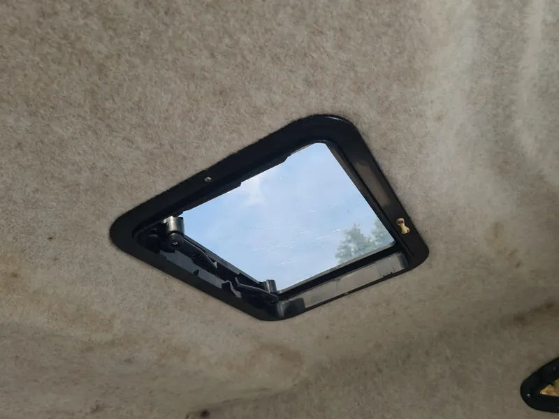 Slide: The Image of Boat cabin ceiling with open hatch, Key West 2300 WA Bluewater, 2000 model. - 15