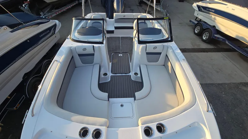 Slide: The Image of 2022 Hurricane SunDeck 191 OB boat interior with spacious seating and sleek design. - 18