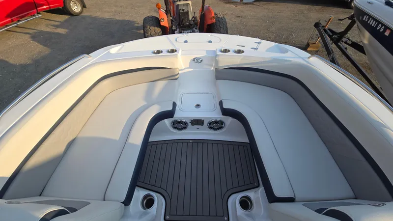 Slide: The Image of 2022 Hurricane SunDeck 191 OB boat interior with spacious seating and modern design. - 20