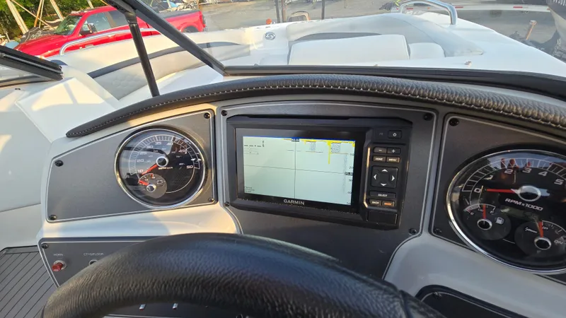 Slide: The Image of Dashboard of 2022 Hurricane SunDeck 191 OB with Garmin navigation system. - 34
