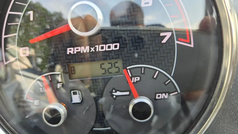 Slide: The Image of Close-up of a 2022 Hurricane SunDeck 191 OB tachometer showing 5.25 RPM x 1000. - 36