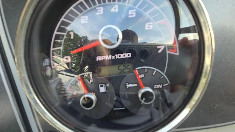 Slide: The Image of Tachometer of 2022 Hurricane SunDeck 191 OB showing 525 RPM and fuel gauge. - 37