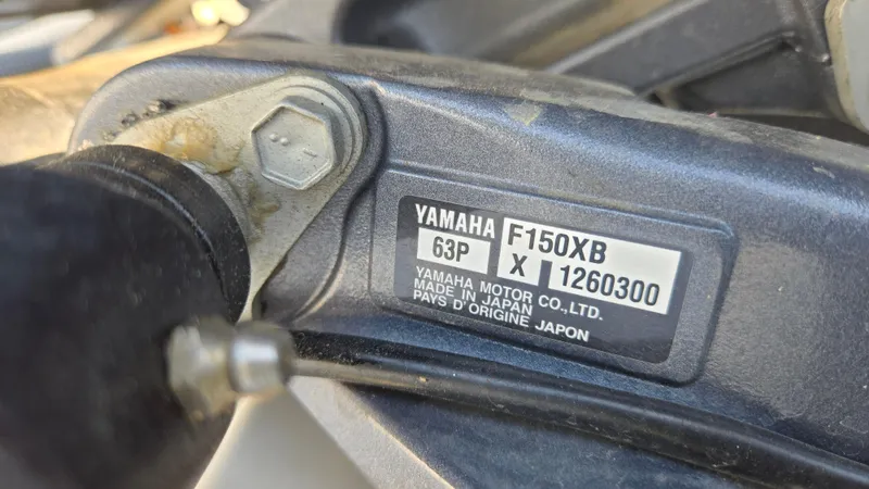 Slide: The Image of Yamaha F150XB engine label on 2022 Hurricane SunDeck 191 OB boat. - 43