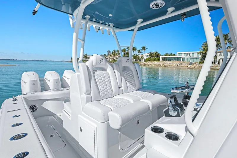 Slide: The Image of 2026 Yellowfin 36 Offshore boat interior with luxurious seating and ocean view. - 23