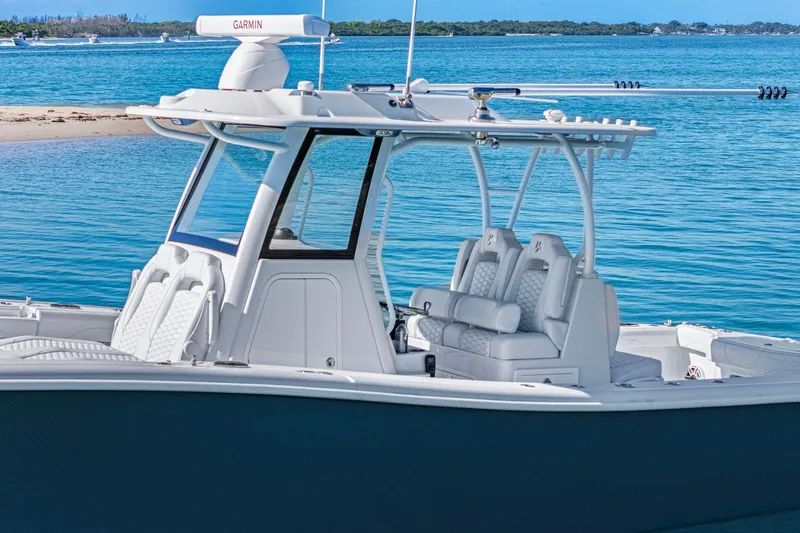 Slide: The Image of 2026 Yellowfin 36 Offshore boat on serene blue water, featuring sleek design and modern amenities. - 45
