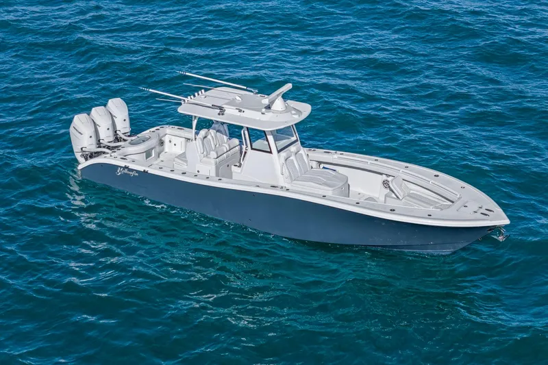 Slide: The Image of 2026 Yellowfin 36 Offshore boat cruising on open blue water. - 47
