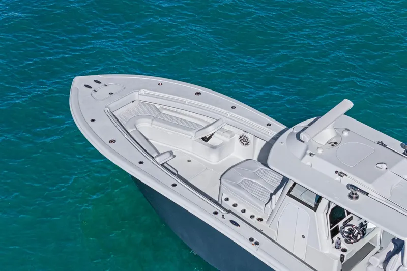 Slide: The Image of 2026 Yellowfin 36 Offshore boat on clear blue water. - 49