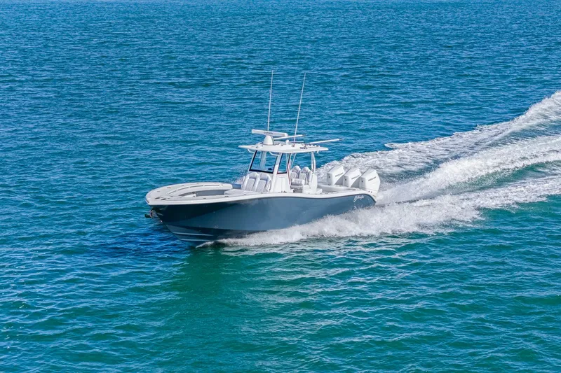 Slide: The Image of 2026 Yellowfin 36 Offshore boat cruising on open blue water. - 8
