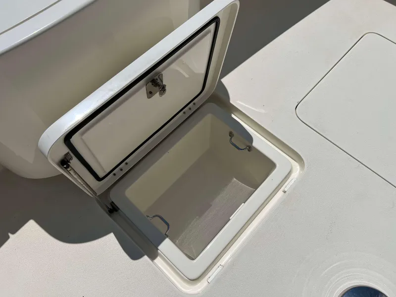 Slide: The Image of Open storage compartment on 2022 Henriques 42 Express Hardtop boat deck. - 27