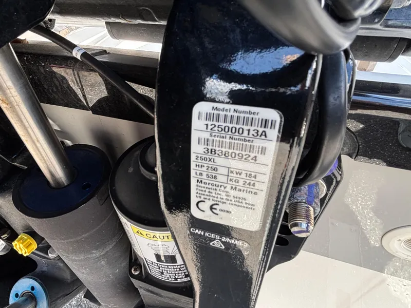 Slide: The Image of Close-up of a 2023 Boston Whaler 220 Dauntless engine serial number label. - 22