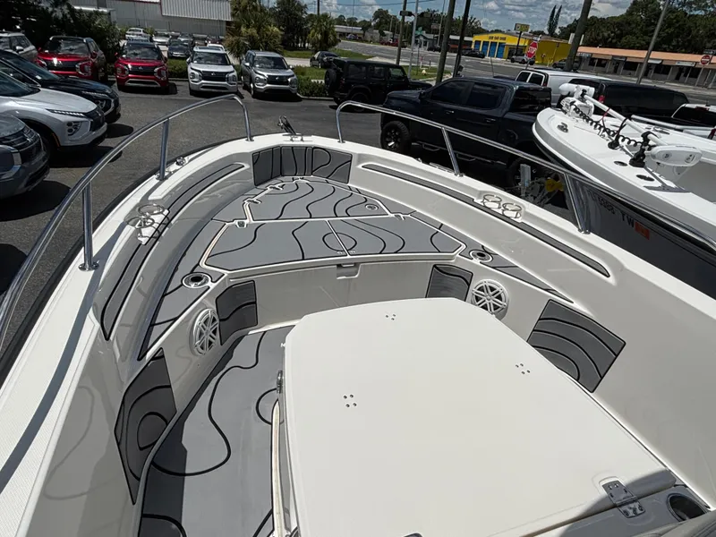 Slide: The Image of 2023 Boston Whaler 220 Dauntless boat interior with stylish seating and modern design. - 6