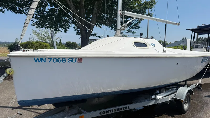 Slide: The Image of 2011 Marlow-Hunter 22 sailboat on trailer, parked outdoors. - 3