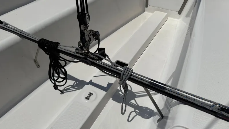 Slide: The Image of Interior view of a 2011 Marlow-Hunter 22 sailboat, featuring rigging and deck details. - 8