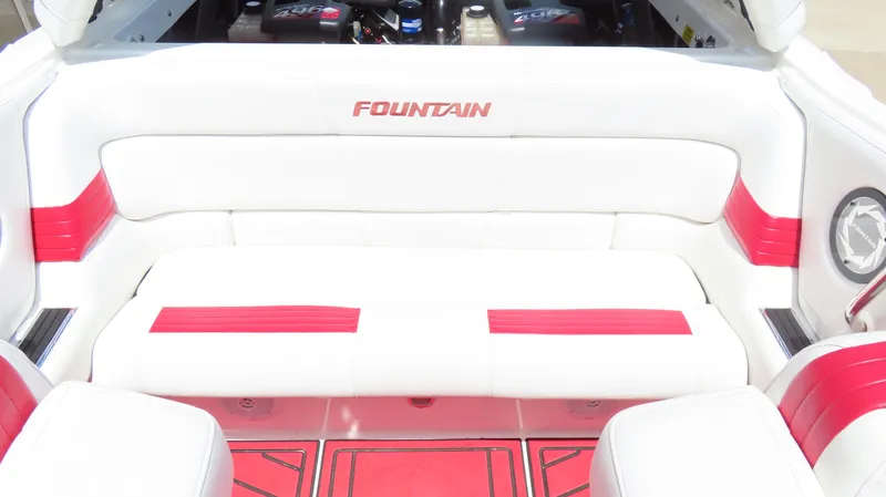 Slide: The Image of 2004 Fountain 35 Executioner boat interior with white and red seating. - 13