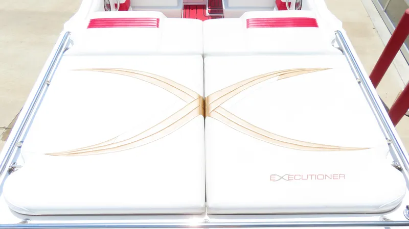 Slide: The Image of 2004 Fountain 35 Executioner boat interior with white and red seating, featuring stylish design elements. - 21