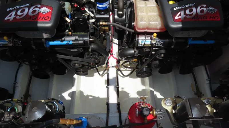 Slide: The Image of Twin MerCruiser 496 MAG HO engines in a 2004 Fountain 35 Executioner boat. - 26