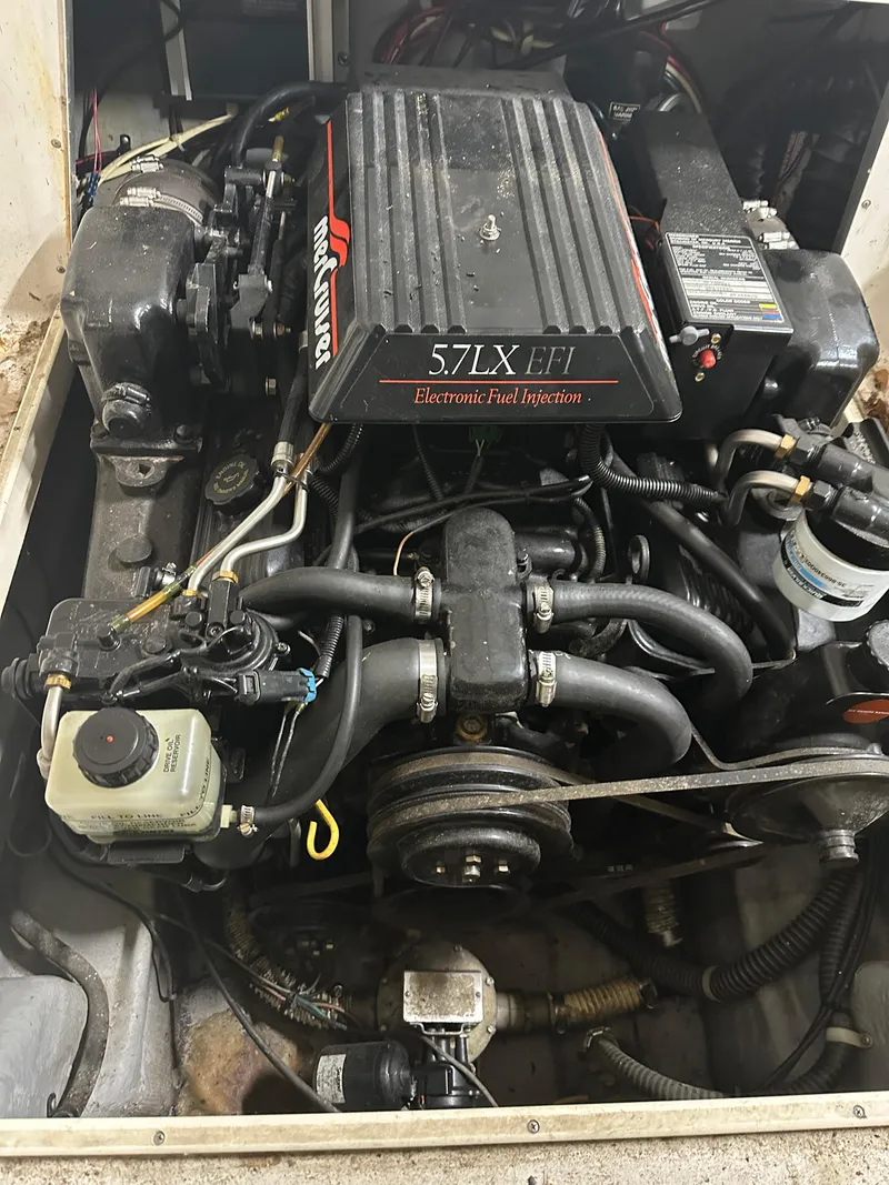 Slide: The Image of Engine of 1996 Pro-Line 251 Walkaround I/O with 5.7LX EFI electronic fuel injection. - 12