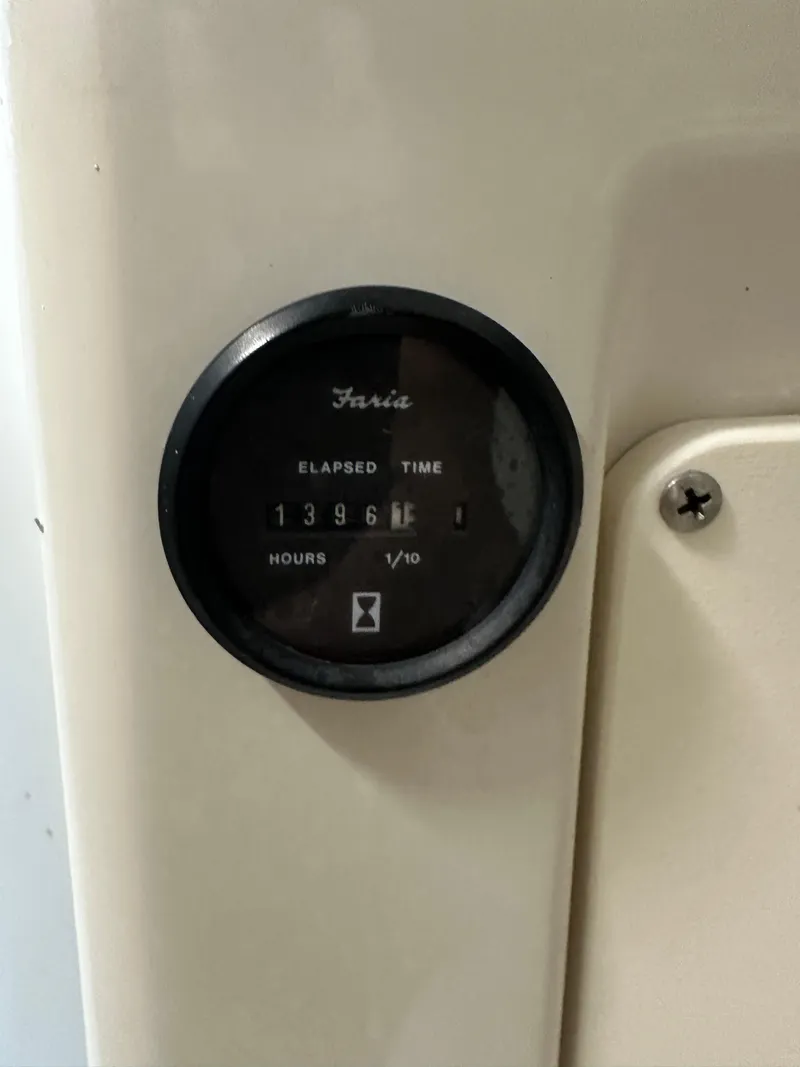 Slide: The Image of Hour meter showing 1396.1 hours on 1996 Pro-Line 251 Walkaround I/O. - 20