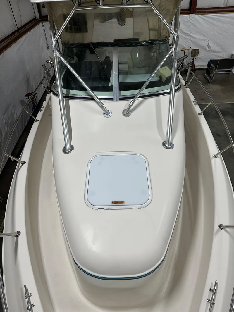 Slide: The Image of 1996 Pro-Line 251 Walkaround I/O boat, top view, in storage facility. - 7