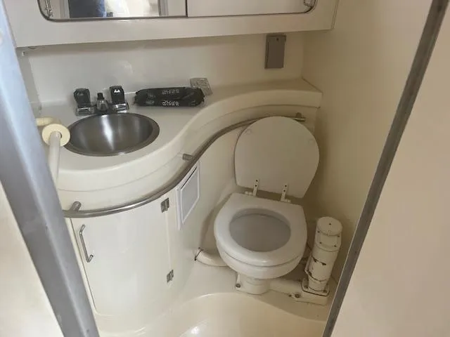 Slide: The Image of Bathroom interior of 1997 Monterey 296 Cruiser with sink and toilet. - 20