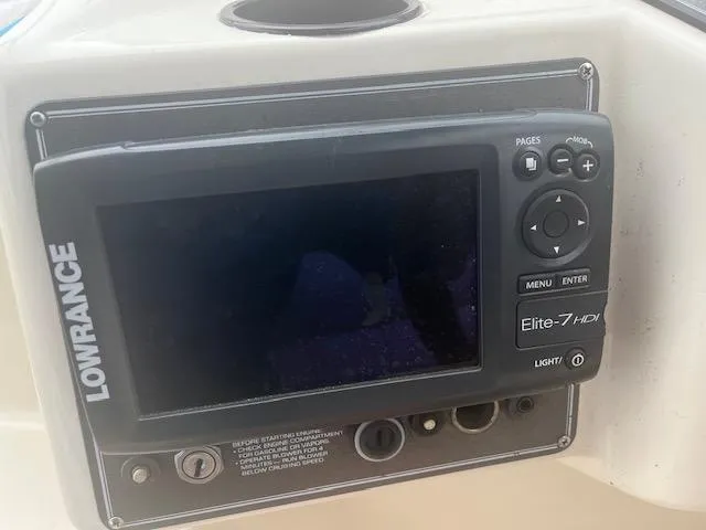 Slide: The Image of Lowrance Elite-7 HDI fishfinder on 1997 Monterey 296 Cruiser dashboard. - 8