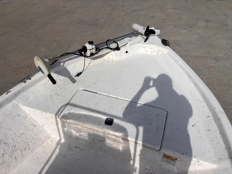 Slide: The Image of 2010 Blue Wave 160 V Bay boat deck with trolling motor and shadow. - 10