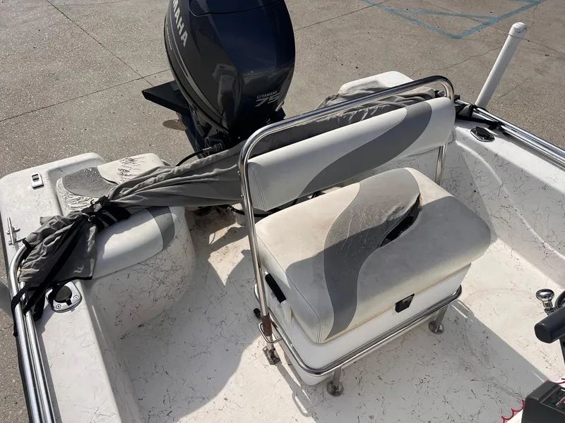 Slide: The Image of 2010 Blue Wave 160 V Bay boat interior with Yamaha motor and seating. - 5