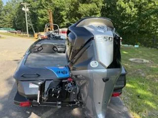 Slide: The Image of 2026 Skeeter ZXE20 boat with powerful engine, parked outdoors. - 9