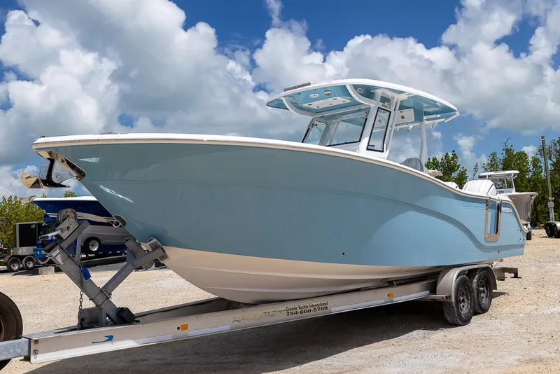 The Image of 2026 Sea Fox 288 Commander boat on trailer under blue sky. - 0