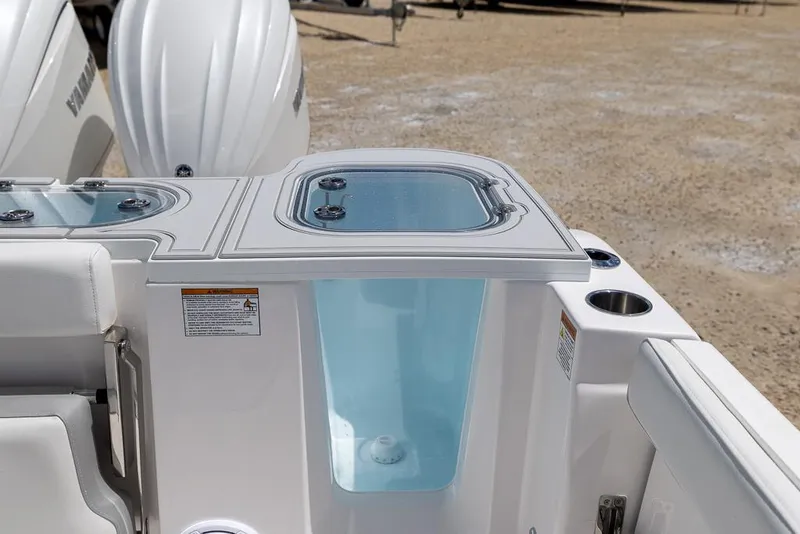 Slide: The Image of 2026 Sea Fox 288 Commander boat with dual Yamaha engines and livewell. - 10