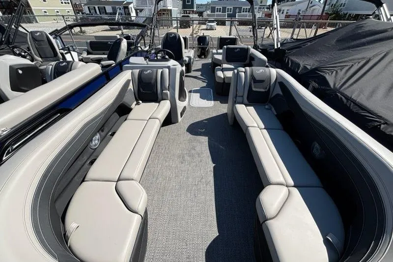 Slide: The Image of 2026 Barletta C24M pontoon boat interior with spacious seating and modern design. - 5