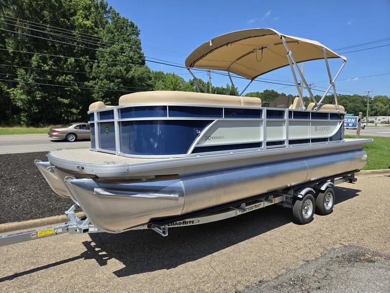 The Image of 2026 Godfrey Xperience 2286 SBX pontoon boat on trailer, featuring a beige canopy. - 1