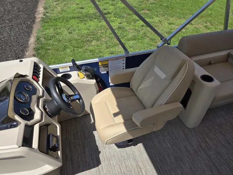 Slide: The Image of Captain's seat and helm of 2026 Godfrey Xperience 2286 SBX Sport Tube boat. - 15