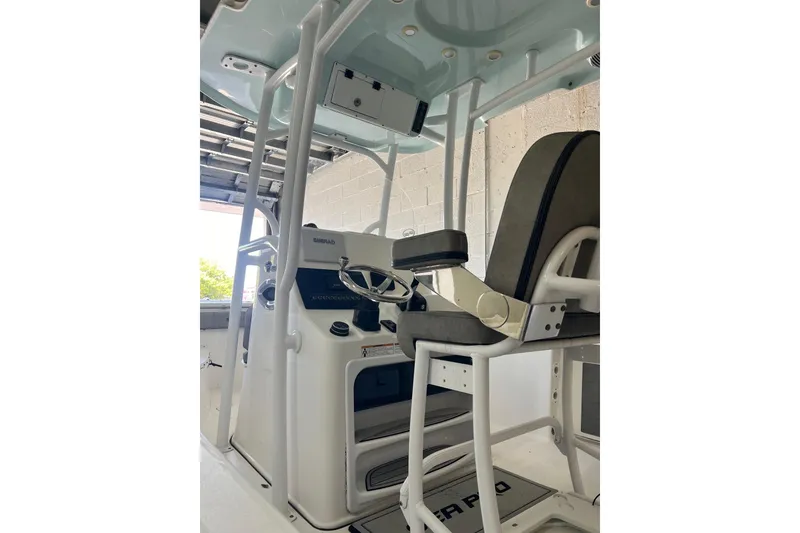 Slide: The Image of 2024 Sea Pro 222 Center Console interior with helm and seating. - 8