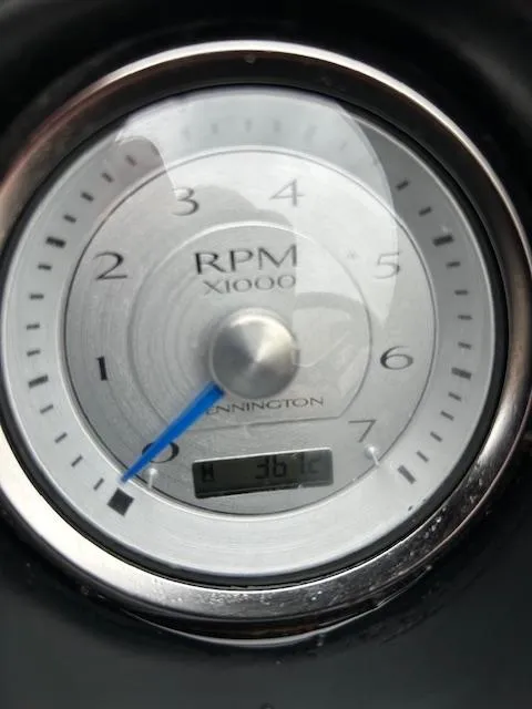 Slide: The Image of Close-up of a 2017 Bennington R23 RPM gauge displaying 361 hours. - 12
