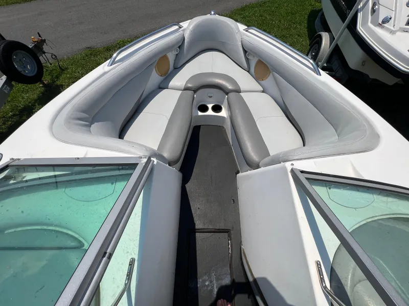 Slide: The Image of 2004 MasterCraft MariStar 210 VRS boat interior with gray and white seating. - 17