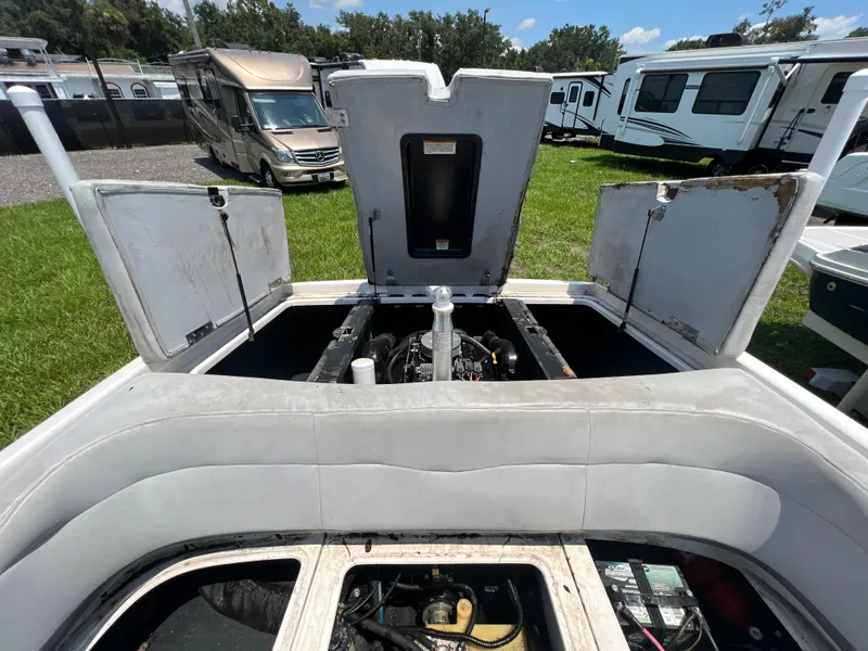 Slide: The Image of 2004 MasterCraft MariStar 210 VRS engine compartment open, showcasing interior components. - 30