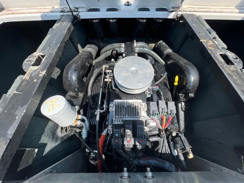 Slide: The Image of 2004 MasterCraft MariStar 210 VRS engine compartment, showcasing detailed mechanical components. - 31