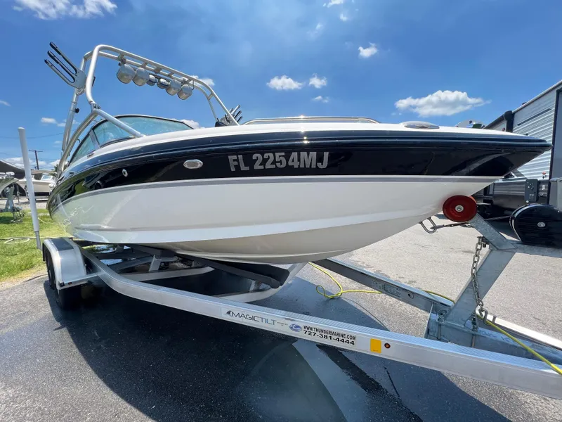 Slide: The Image of 2004 MasterCraft MariStar 210 VRS boat on trailer under clear blue sky. - 5