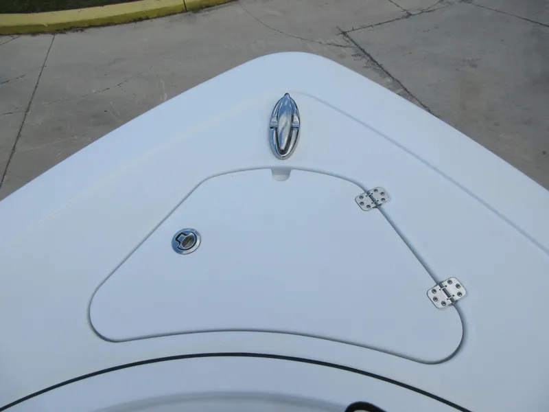 Slide: The Image of Bow deck of 2021 Sportsman Open 352 Center Console boat, featuring hatch and cleat. - 19